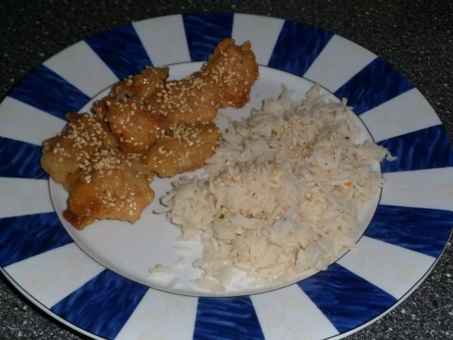 Hähnchenbrust süß - sauer in Honig und Sesam - Rezept