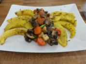 Backofenkürbis mit Bratkäse und Tomaten-Champignons - Rezept