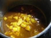 Kartoffeln, in Tomatensoße gegart - Rezept