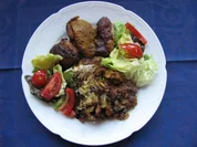 Geflügel: Putenflügel auf Speckknödelbett - Rezept