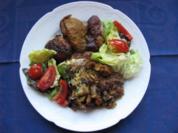 Geflügel: Putenflügel auf Speckknödelbett - Rezept
