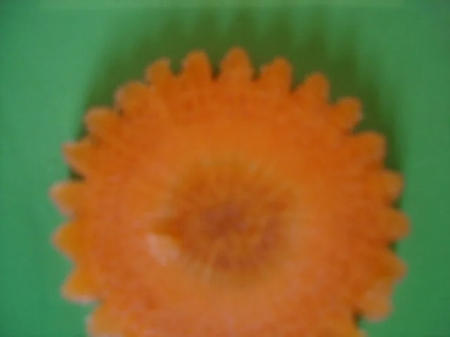 Rezept: Kotelett mit Möhrenblüten und Kartoffelbrei Kotelett mit Möhrenblüten und Kartoffelbrei - Rezept