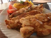 Schweinelachscheiben in knuspriger Mandelblättchenpanade - Rezept