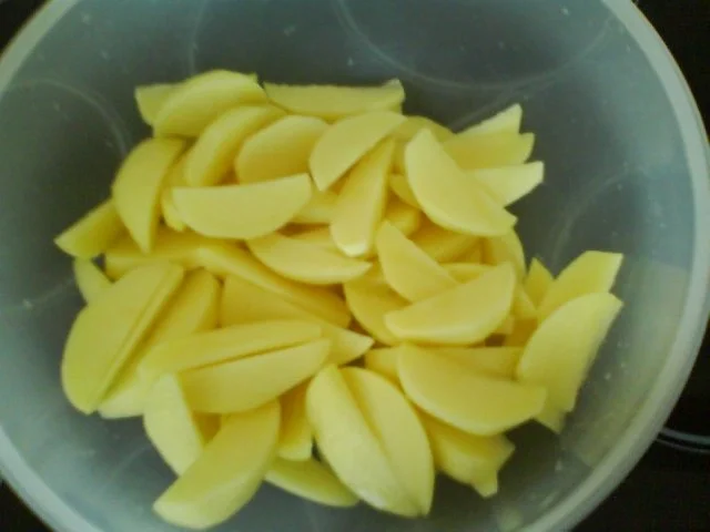 Rezept: Senfschmorgurken mit Kräuterkartoffelspalten Bild Nr. 3 Senfschmorgurken mit Kräuterkartoffelspalten - Rezept - Bild Nr. 3