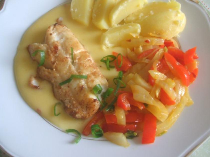 Kabeljau in Butter gebraten mit Kartoffelspalten Orangen Sahnesoße ...