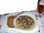 Grünkohltopf mit Kartoffeln, Kassler und Würstchen - Rezept