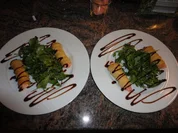 Blätterteig Lachs Creme Röllchen an Rucola - Rezept