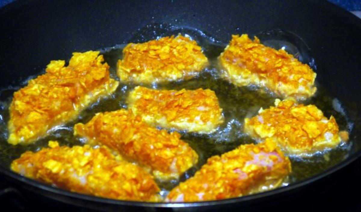 Scharfe Fischnuggets mit Bratreis - Rezept - Bild Nr. 3