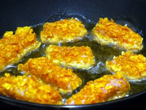 Scharfe Fischnuggets mit Bratreis - Rezept - Bild Nr. 3