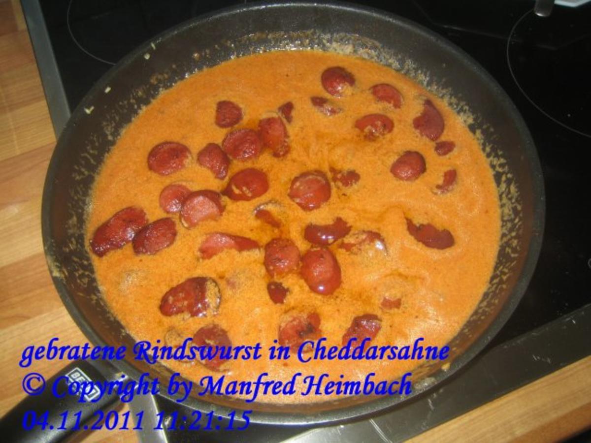 Wurst – gebratene Rindswurst in Cheddarsahne - Rezept - kochbar.de