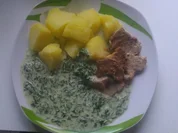 Schweinefilet auf Spinat-Sahne Soße mit Kartoffeln - Rezept