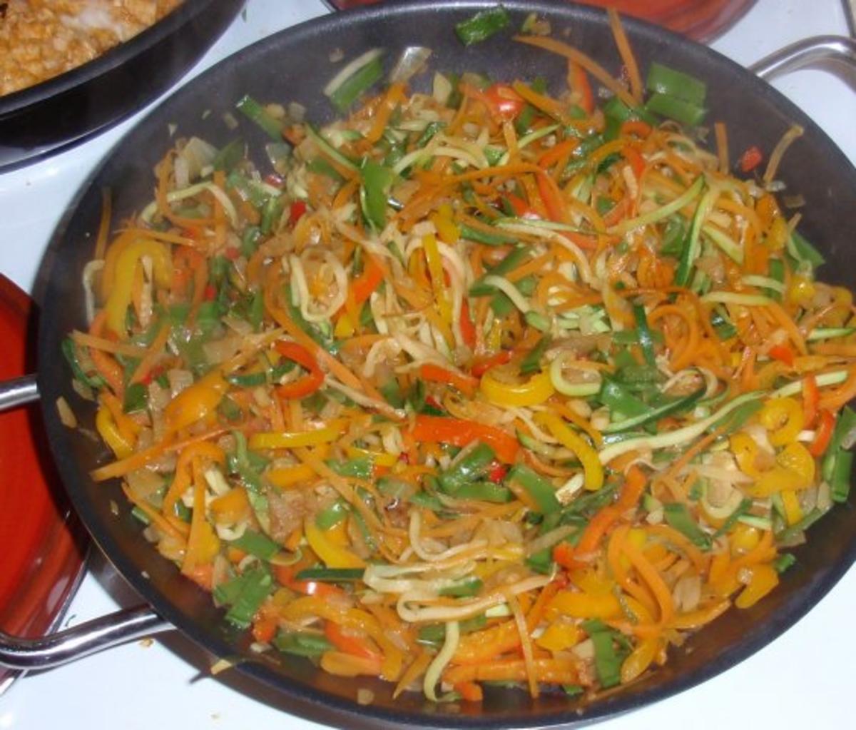 Pikante Fischnuggets mit Gemüsereis - Rezept - Bild Nr. 10
