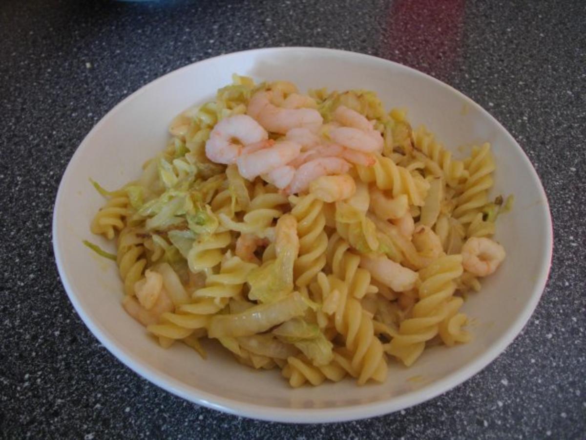 Krabbennudeln mit Orangen-Curry-Soße - Rezept