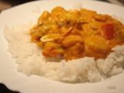 Geflügel, Huhn: Hähnchen-Kürbis-Curry mit Erdnüsse und Reis - Rezept