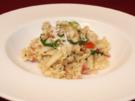 Nudeln mit Rucola, Kirschtomaten, Parmesan und Pinienkernen - Rezept