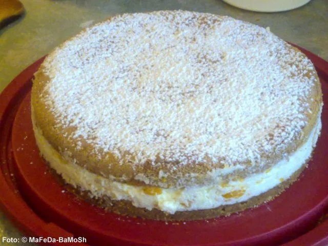 Mandarinentorte mit Nusshaube - Rezept