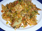 Gebratene Ravioli in Gemüseallerlei - Rezept