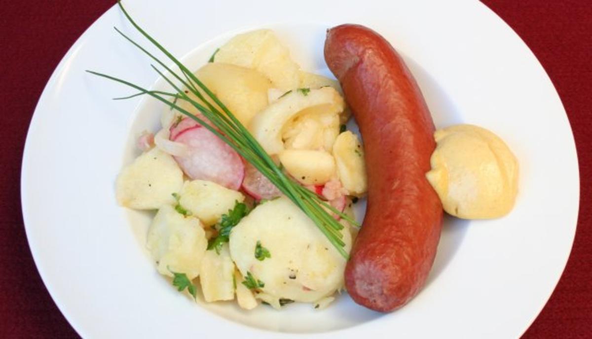 Gewärmte Rindswurst an lauwarmem Erdäpfelsalat - Rezept