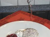 Rezept: Kirschwasserbömble mit Punschkirschen und Schokosoße Kirschwasserbömble mit Punschkirschen und Schokosoße - Rezept