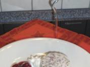 Kirschwasserbömble mit Punschkirschen und Schokosoße - Rezept