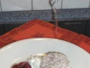 Kirschwasserbömble mit Punschkirschen und Schokosoße - Rezept