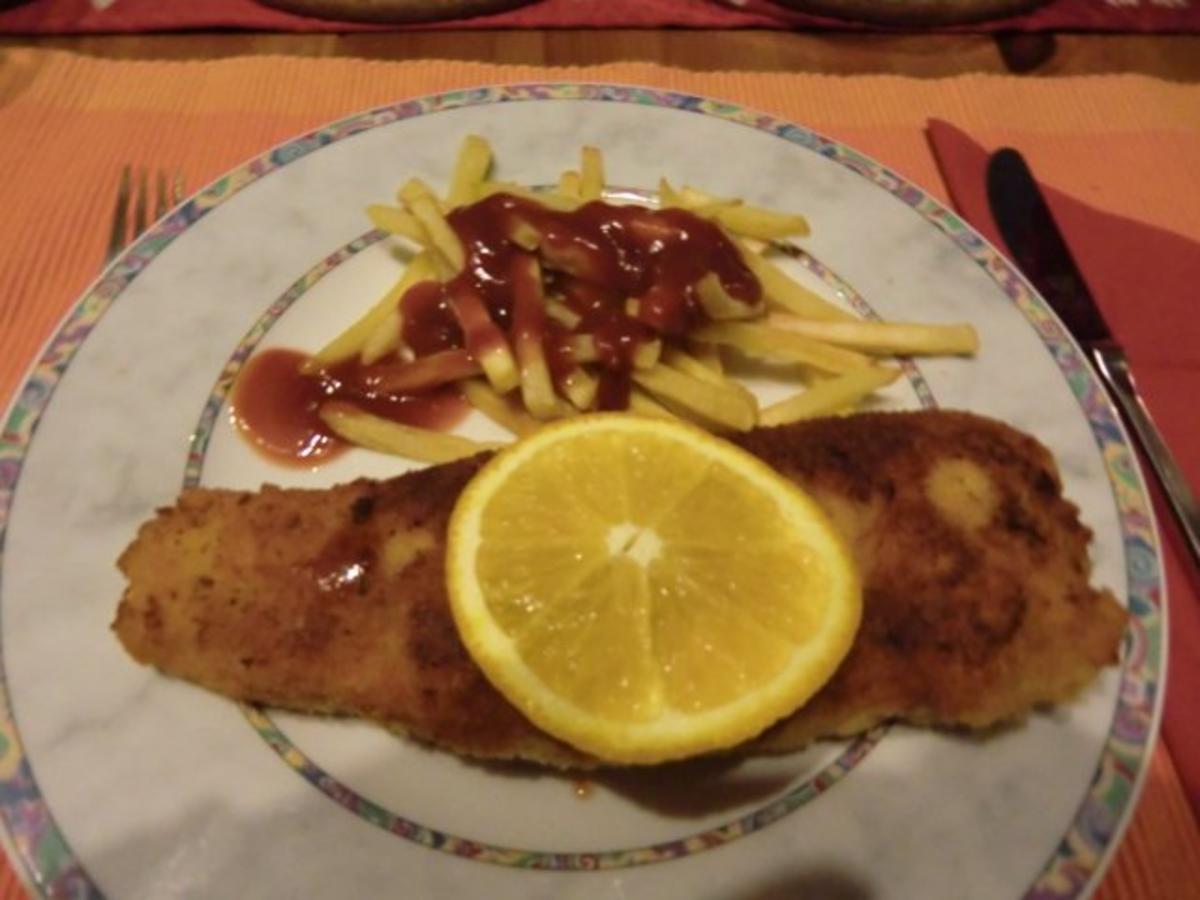 Putenschnitzel in Parmesanpanade mit Pommes - Rezept - Bild Nr. 3