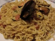 Chinesische Nudeln aus dem Wok mit Muscheln - Rezept