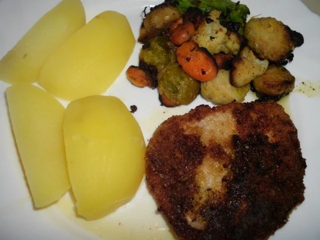 Rezept: Wintergemüse an Kräuterschnitzel Wintergemüse an Kräuterschnitzel - Rezept