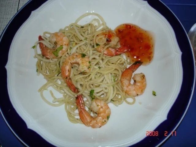 Rezept: Eiernudeln mit Koriander-Garnelen Eiernudeln mit Koriander-Garnelen - Rezept