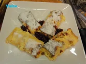 Überbackene Topfenpalatschinken - Rezept