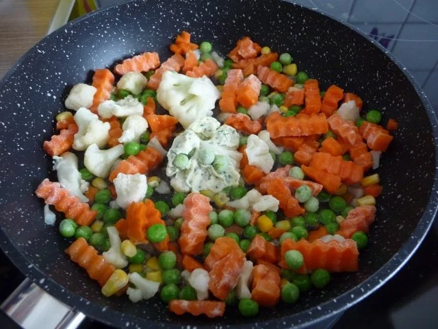 Pasta  :  Tortilini an Buttergemüse mit geriebenem Käse - Rezept - Bild Nr. 4