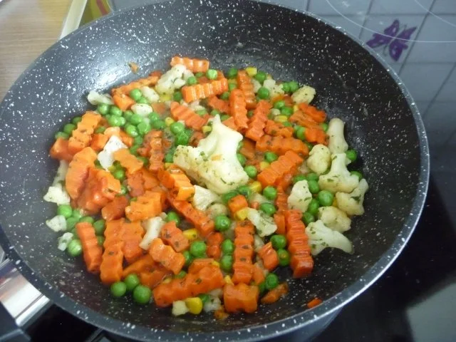 Pasta  :  Tortilini an Buttergemüse mit geriebenem Käse - Rezept - Bild Nr. 5