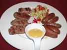 Mititei mit hausgemachten Kartoffelecken und selbstgemachtem Krautsalat - Rezept