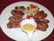Mititei mit hausgemachten Kartoffelecken und selbstgemachtem Krautsalat - Rezept