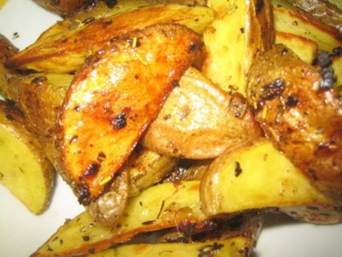 Bilder für Beilage - Kräuterkartoffeln aus dem Backofen - Rezept