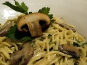 Spaghetti mit Cognac-Champignons - Rezept