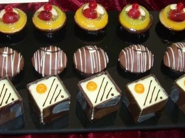 Espresso & Digestif  für die Männer eine Hawanna & für die Frauen Petit-Fours - Rezept