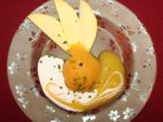 Mangosorbet mit Joghurtvanillesoße und Mangosoße, verfeinert mit Pistaziensplittern - Rezept