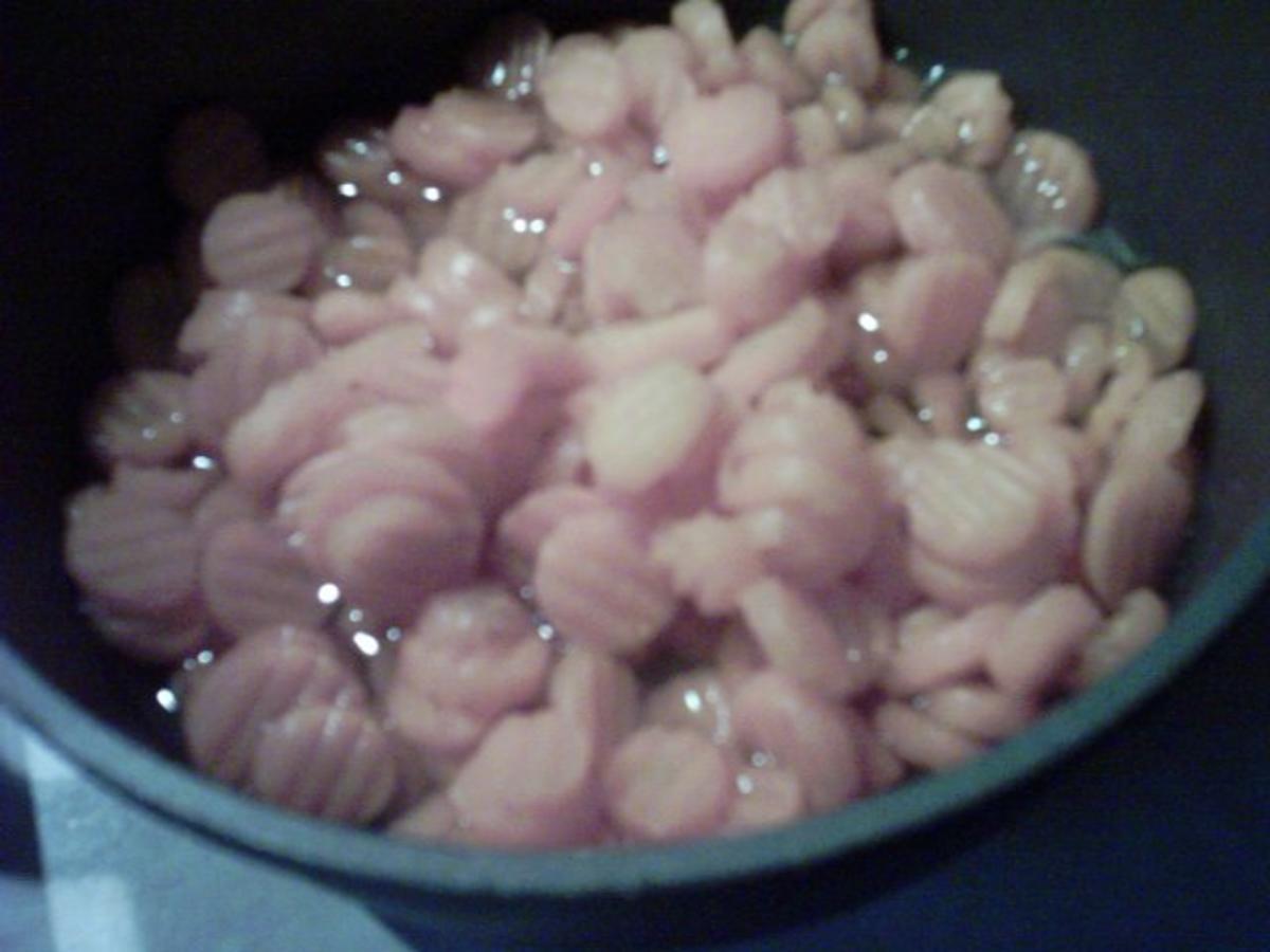 Schweinefleisch mit gefüllten Salzkartoffeln,Gemüserahmsoße,Buttermöhren und Bohnen im Spe - Rezept - Bild Nr. 7