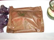 Lachs in Pergament gegart, dazu ein Ei auf getrüffeltem Crèmespinat - Rezept