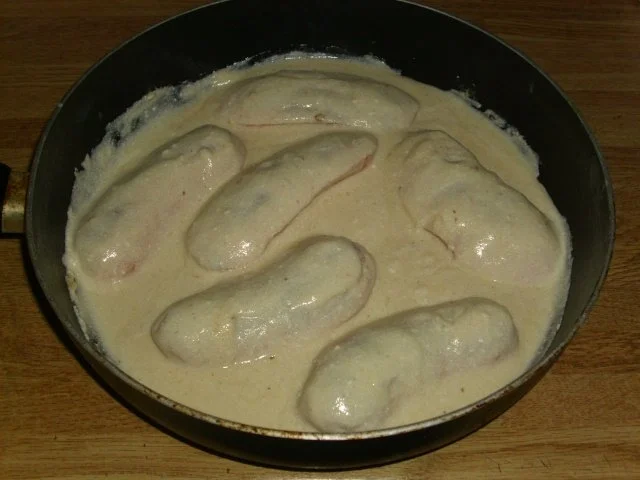 Knacker in Rahmsoße - Rezept