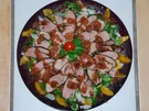 Rezept: Entenbrusttranchen auf Feldsalat umzingelt von Rote Beete-Carpaccio Entenbrusttranchen auf Feldsalat umzingelt von Rote Beete-Carpaccio - Rezept