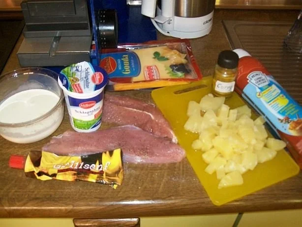 Rezept: Putenschnitzel mit Ananas im Ofen überbacken mit Wildreis Bild Nr. 2 Putenschnitzel mit Ananas im Ofen überbacken mit Wildreis - Rezept - Bild Nr. 2