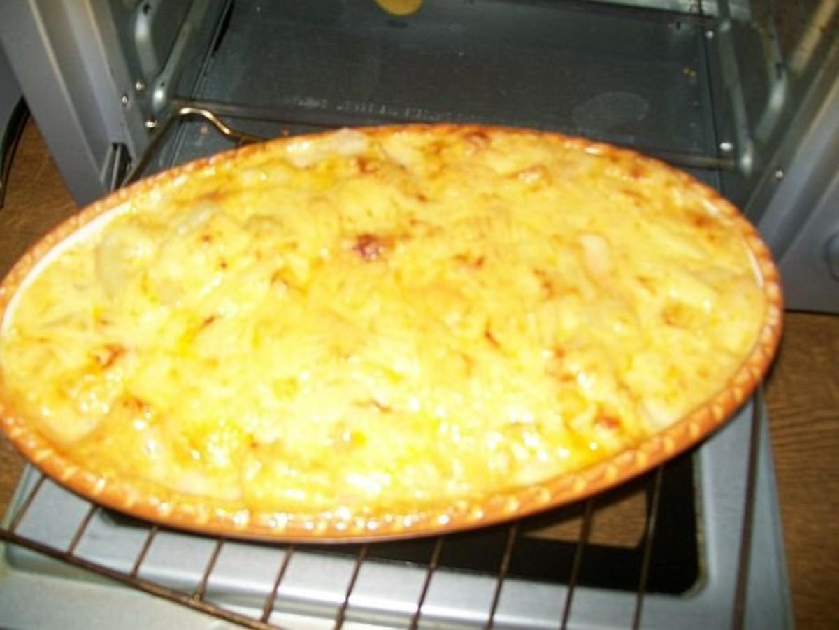Putenschnitzel mit Ananas im Ofen überbacken mit Wildreis - Rezept - Bild Nr. 3