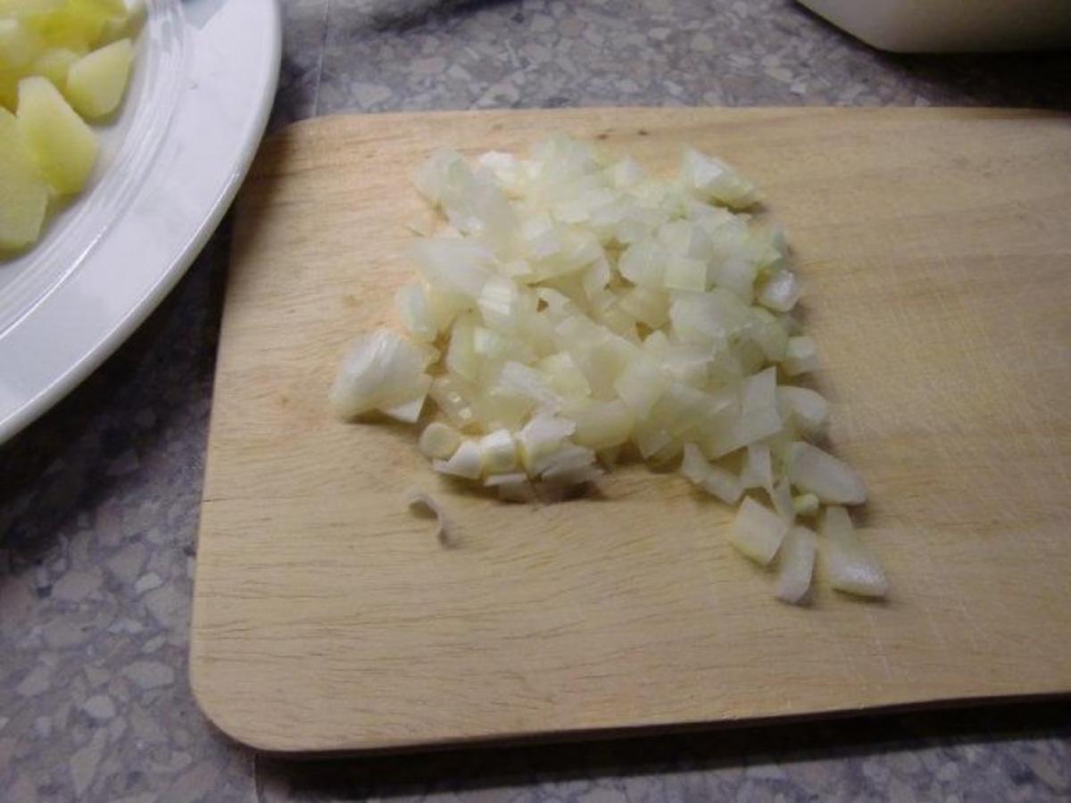 Leberkäse auf Bratkartoffeln mit Spiegelei - Rezept - Bild Nr. 3