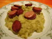 Bohnen untereinander mit gebratenen Mettwürstchen - Rezept