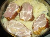 Ripperl mit Sauerkraut und Zwiebel Speck Stampf - Rezept