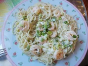 Rezept: Garnelen in Sahnesauce auf Spagettinest Garnelen in Sahnesauce auf Spagettinest - Rezept