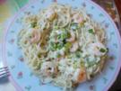Garnelen in Sahnesauce auf Spagettinest - Rezept