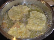 Pariserschnitzel mit Erbsenreis - Rezept